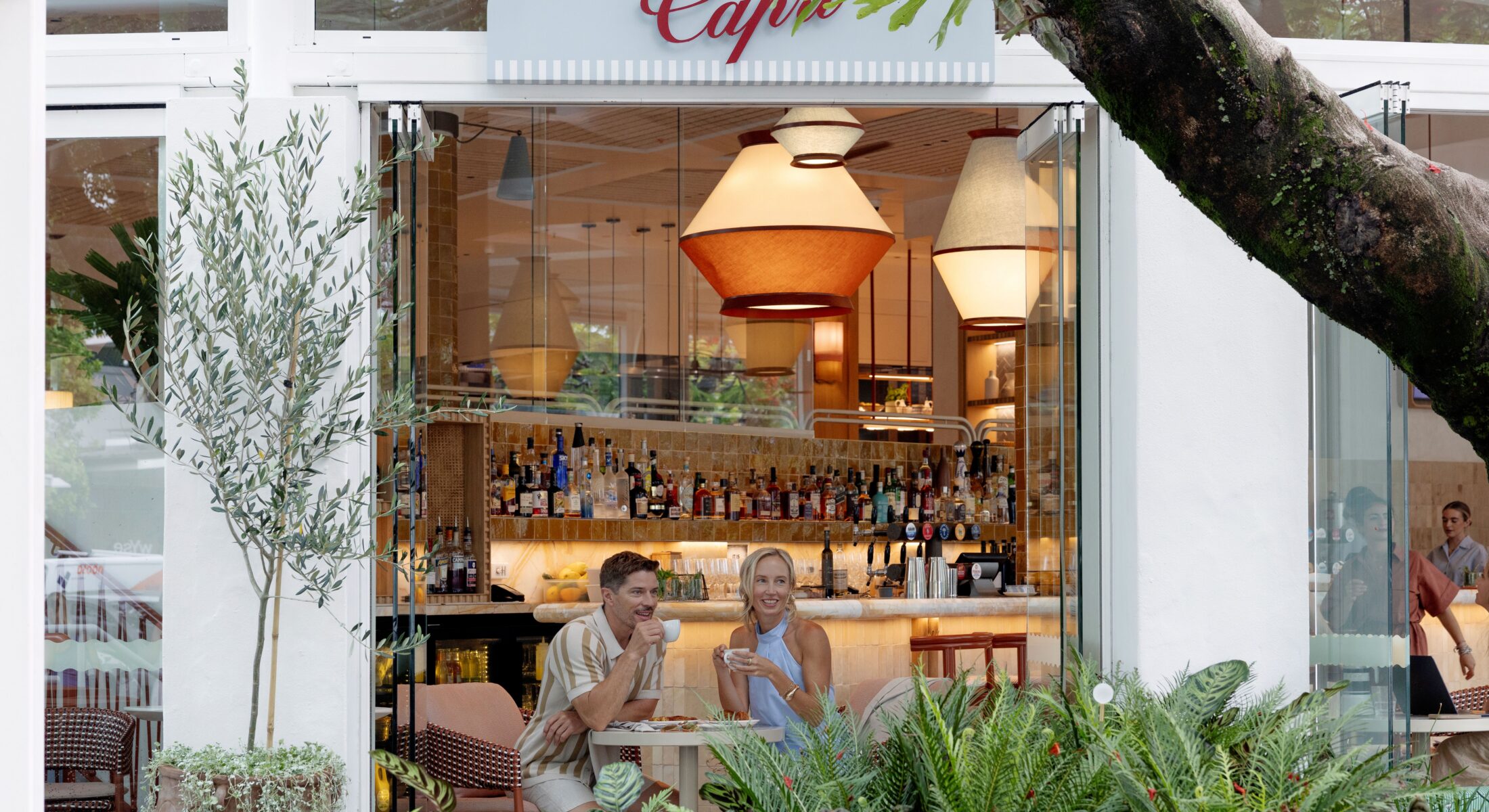 Couple enjoying a coffee at Bar Capri